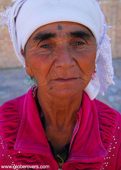 Smoke blowing lady of Bukhara, Uzbekistan