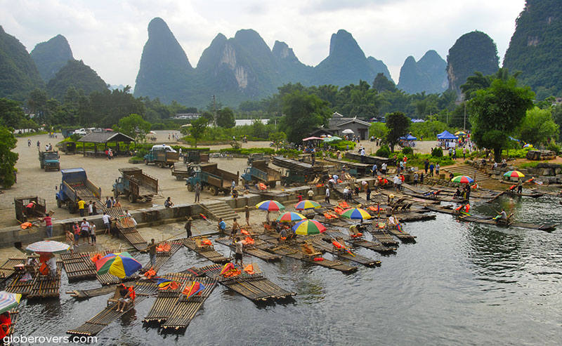 Bamboo rafting on the Li River near Xianggong Hill, Yangshuo Area, Guangxi, China
