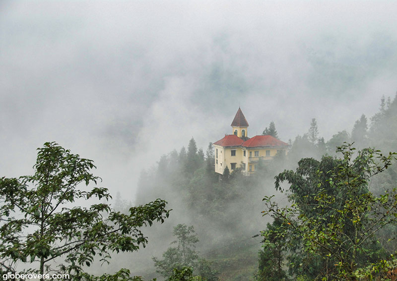 Heavy fog hangs over the hills around Sapa
