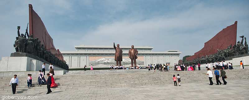 Kim and Kim at Mansudae Grand Monument in front of Korean Revolution Museum, Pyongyang, North Korea, DPRK