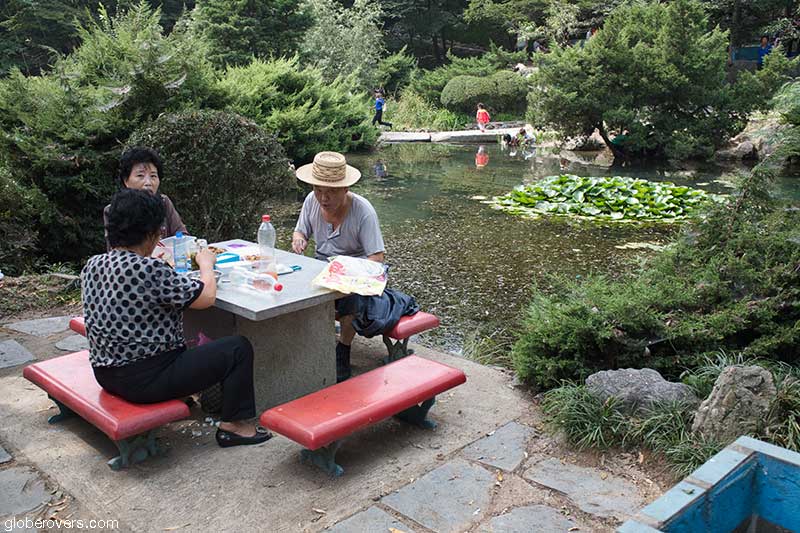 People relaxing in a park, Pyongyang, North Korea, DPRK