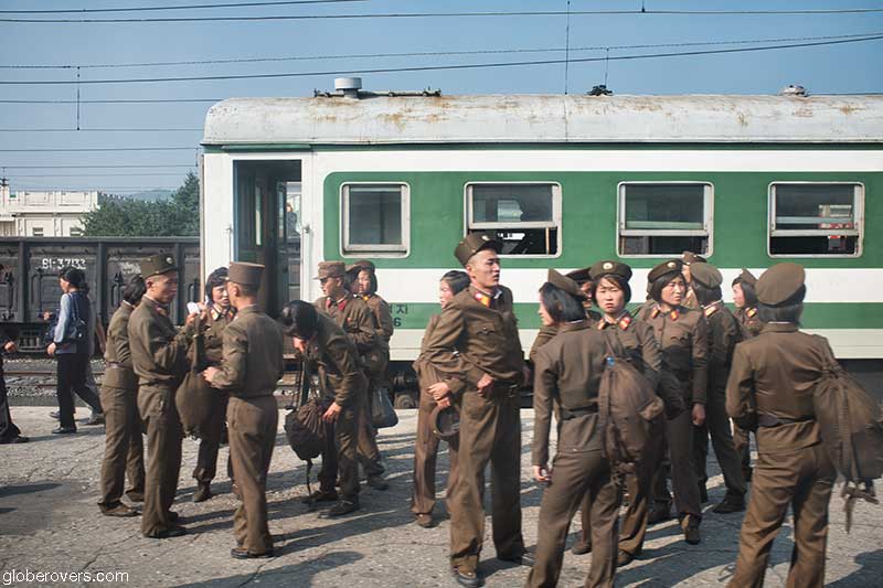 Soldiers at the first train station in North Korea, just across the border from China. Here our paperwork was checked by officers coming onto the train. 