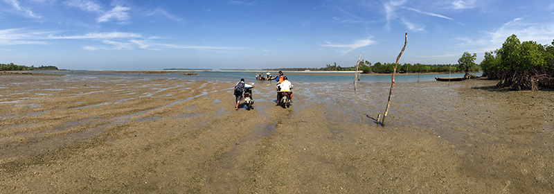 Motorbike on beach in Myanmar