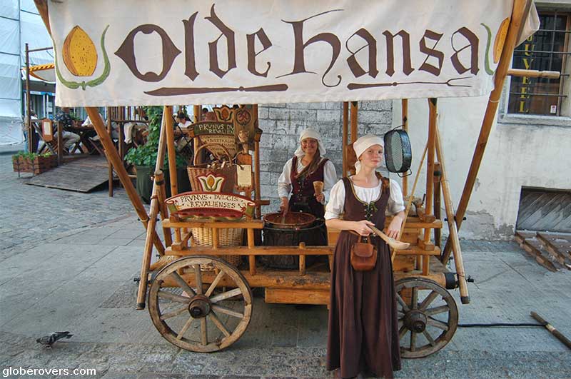 Girls selling chocolates on Town Hall Square (Raekoja Plats), Tallinn, Estonia