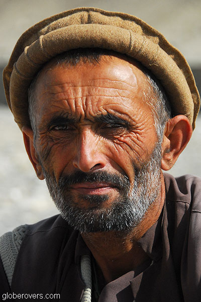 Man at Saturday bazaar on the border of Tajikistan and Afghanistan outside town of Ishkashim, Tajikistan