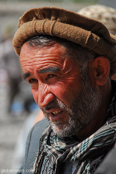 Man at Saturday bazaar on the border of Tajikistan and Afghanistan outside town of Ishkashim, Tajikistan