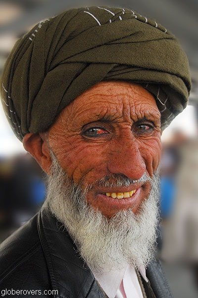 Man at Saturday bazaar on the border of Tajikistan and Afghanistan outside town of Ishkashim, Tajikistan