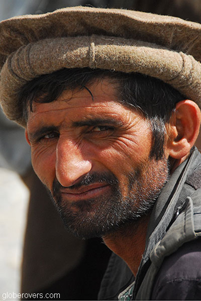 Man at Saturday bazaar on the border of Tajikistan and Afghanistan outside town of Ishkashim, Tajikistan