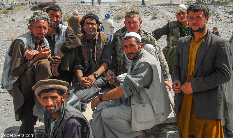Group of men at the Saturday bazaar on the border of Tajikistan and Afghanistan outside town of Ishkashim, Tajikistan