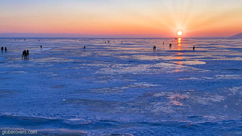 Sunset over frozen Lake Baikal at Listvyanka, Siberia, Russia