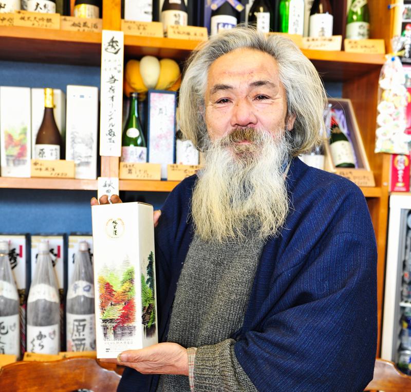 Japanese man with sake, Akita, Japan