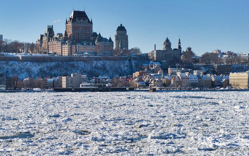 River in front of the Fairmont Le Château Frontenac Hotel, Quebec City, Canada
