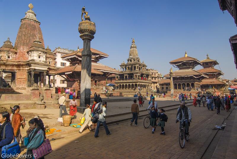 LtoR: Narsingha Temple, Vishnu Temple, Krishna Mandir Temple, Vishwanath Temple , King Yoganarendra Malla's Statue (F), Bhimsen Temple (far R) Patan, Nepal