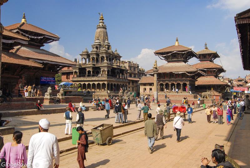 Krishna Mandir Temple (L), Vishwanath Temple (R), Bhimsen Temple (R), Garuda Statue on Column (F), Durbar Square, Patan, Nepal